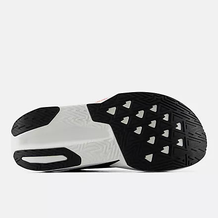 mens new balance fuel cell rebel version 5, light, bouncy daily trainer, white and black colour with orange details, side profile of sole of shoe on a white background