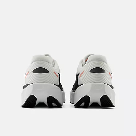 mens new balance fuel cell rebel version 5, light, bouncy daily trainer, white and black colour with orange details, back profile of two runners on a white background