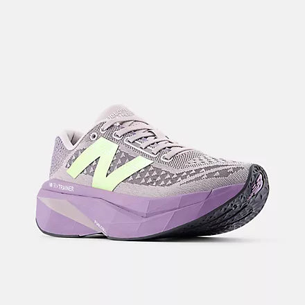 new balance fuel cell super comp v3 for women, carbon plated speed training and racing running shoe, grape purple colour with lime green logo, side profile of shoe