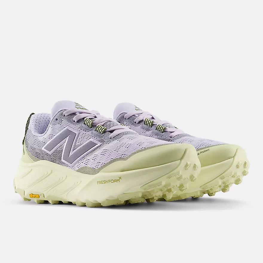 new balance hierro v9 womens, cushioned trail and mixed terrain running and walking shoe, light greyish purple and cream colour, side profile of shoe