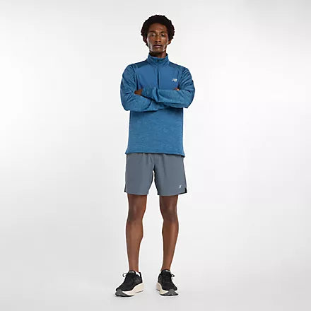 new balance athletics heat grid quarter zip for men, warm half zip running top, blue colour, man wearing blue half zip running jumper full body