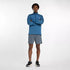 new balance athletics heat grid quarter zip for men, warm half zip running top, blue colour, man wearing blue half zip running jumper full body