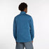 new balance athletics heat grid quarter zip for men, warm half zip running top, blue colour, man wearing blue half zip running jumper from behind