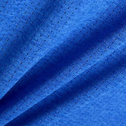 new balance athletics long sleeve shirt for men, lightweight breathable long sleeve top, royal blue colour, close up of blue breathable fabric