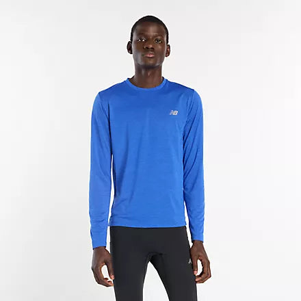 new balance athletics long sleeve shirt for men, lightweight breathable long sleeve top, royal blue colour, man wearing long sleeve blue nb top with black tights