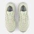 new balance 880v15 pair of light green running shoes with 'Fresh Foam' and 'New Balance' branding