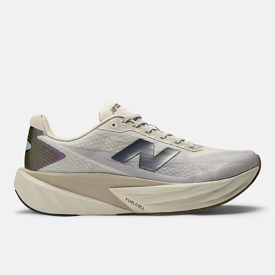 new balance rebel v5 for men, lightweight cushioned running shoe for long and short distance runs, light grey running shoe with greyish purple logo, side profile of new balance running shoe