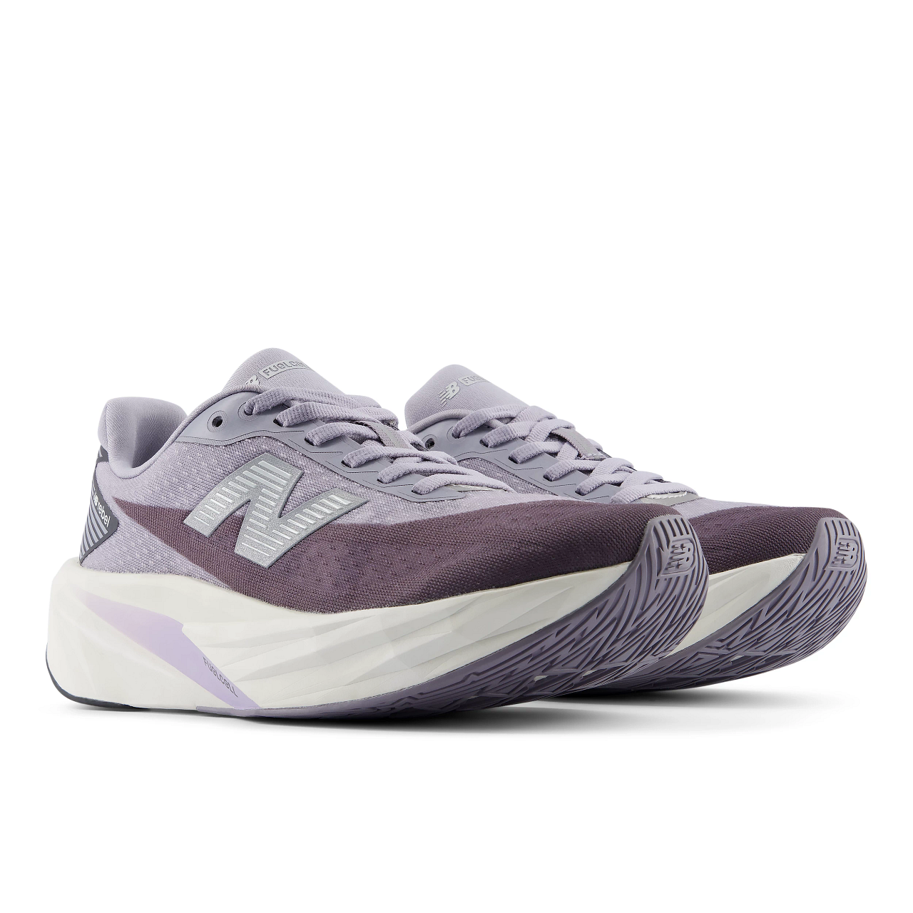 new balance rebel v5 womens, super lightweight versatile training road running shoe, light purple and grey colour with a white sole, side profile of two shoes
