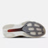 nb supercomp rebel mens, lightweight speed training and racing shoe, white and cream with black and red details, bottom of shoe exposing red and black carbon plate