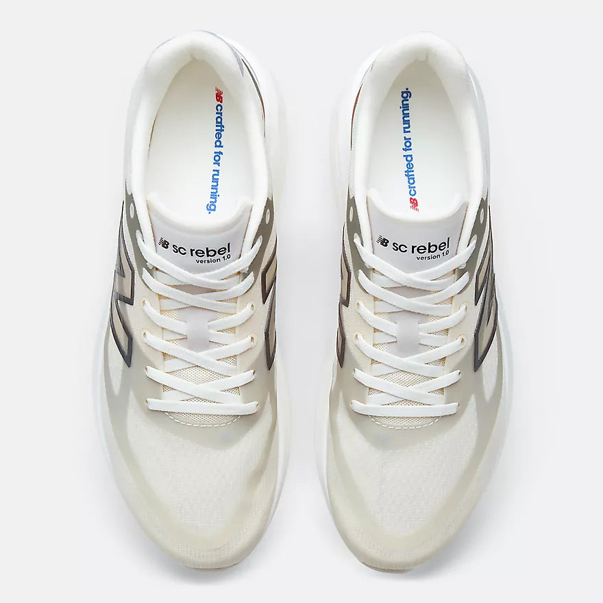 nb supercomp rebel mens, lightweight speed training and racing shoe, white and cream with black and red details, top of shoes