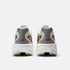 nb supercomp rebel mens, lightweight speed training and racing shoe, white and cream with black and red details, back heels of shoes