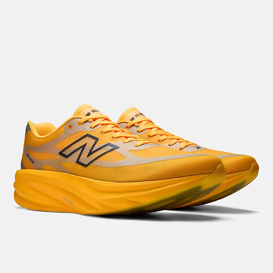 new balance super comp rebel mens, durable cushioned everyday training and racing shoe, sunny yellow orange colour, pair of shoes