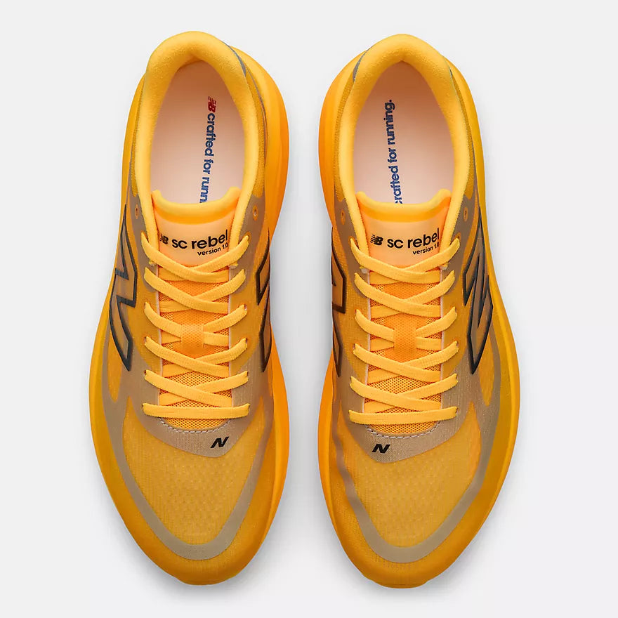 new balance super comp rebel mens, durable cushioned everyday training and racing shoe, sunny yellow orange colour, shoes from above
