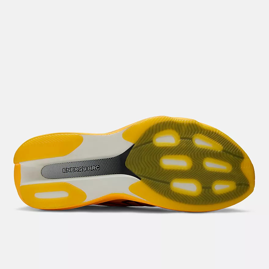 new balance super comp rebel mens, durable cushioned everyday training and racing shoe, sunny yellow orange colour, sole of shoe