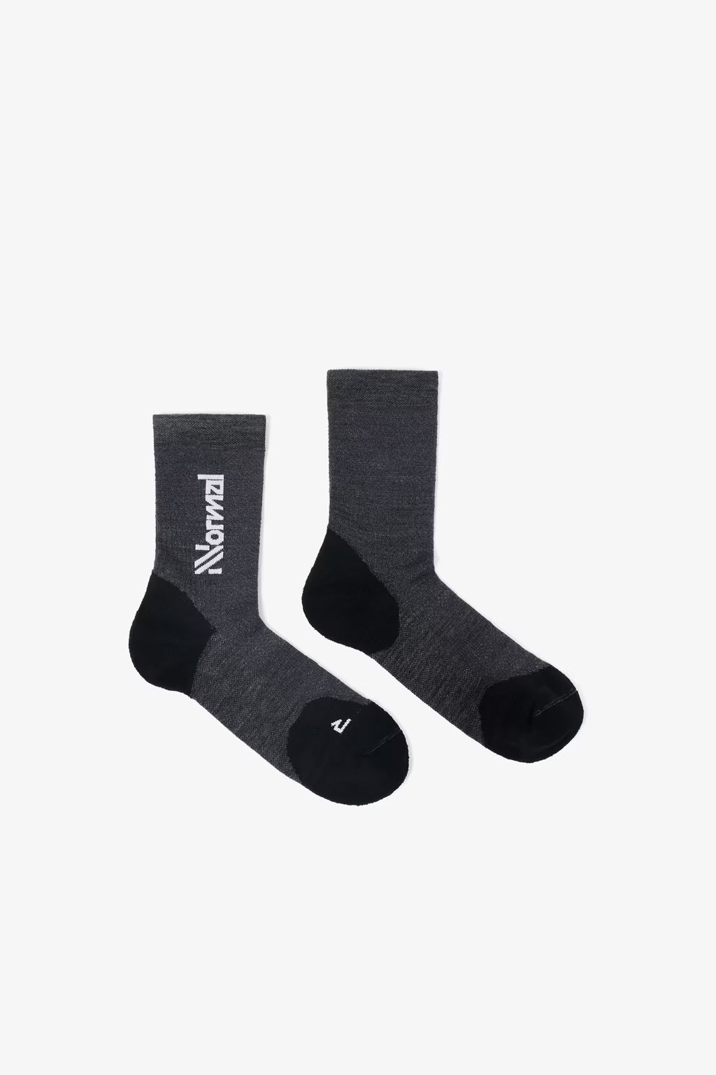nnormal merino sock, warm thermoregulating sock for trail running, black colour, sock laid out flat on white background