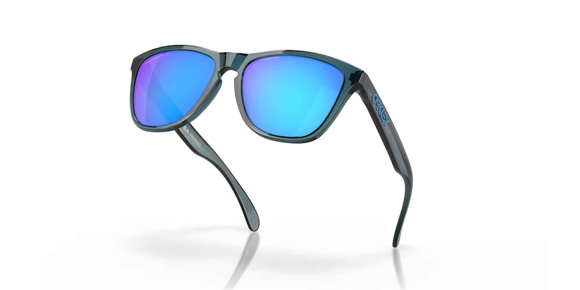 oakley frogskins polarised sunglasses, blue prizim sapphire polarised lenses, black translucent frame, front angled sunglasses, sunglasses lifted 