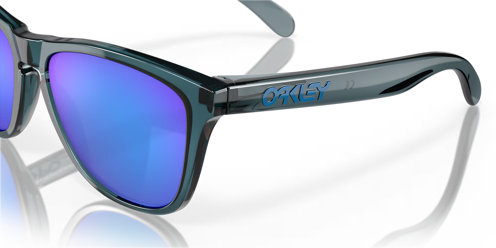 oakley frogskins polarised sunglasses, blue prizim sapphire polarised lenses, black translucent frame, front angled sunglasses, close up of side arm logo