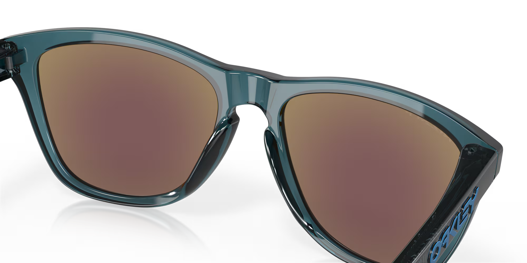 oakley frogskins polarised sunglasses, blue prizim sapphire polarised lenses, black translucent frame, front angled sunglasses, close up of inside lens