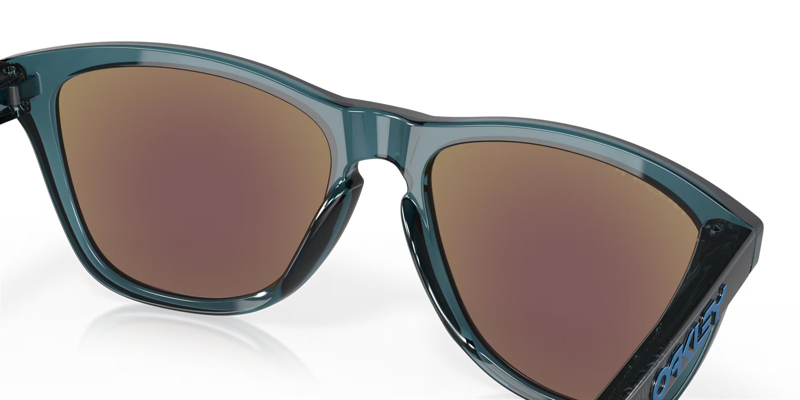 oakley frogskins polarised sunglasses, blue prizim sapphire polarised lenses, black translucent frame, front angled sunglasses, close up of inside lens