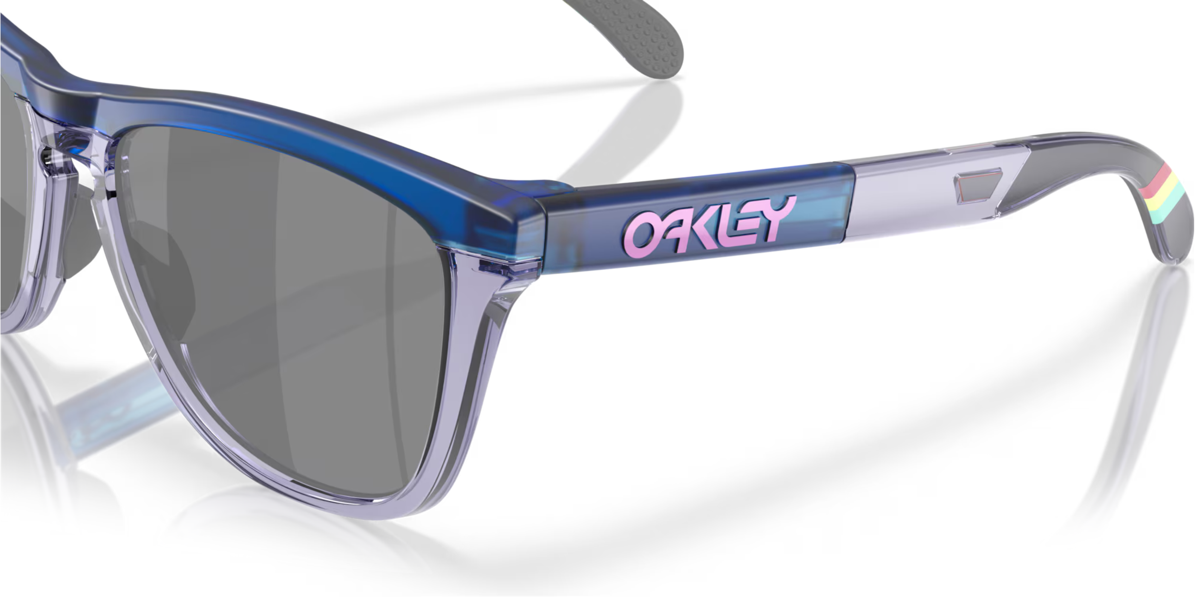 up close of arm oakley frogskin fortnite sunglasses, classic style polarised sunglasses, blue and grey frame with dark grey lense