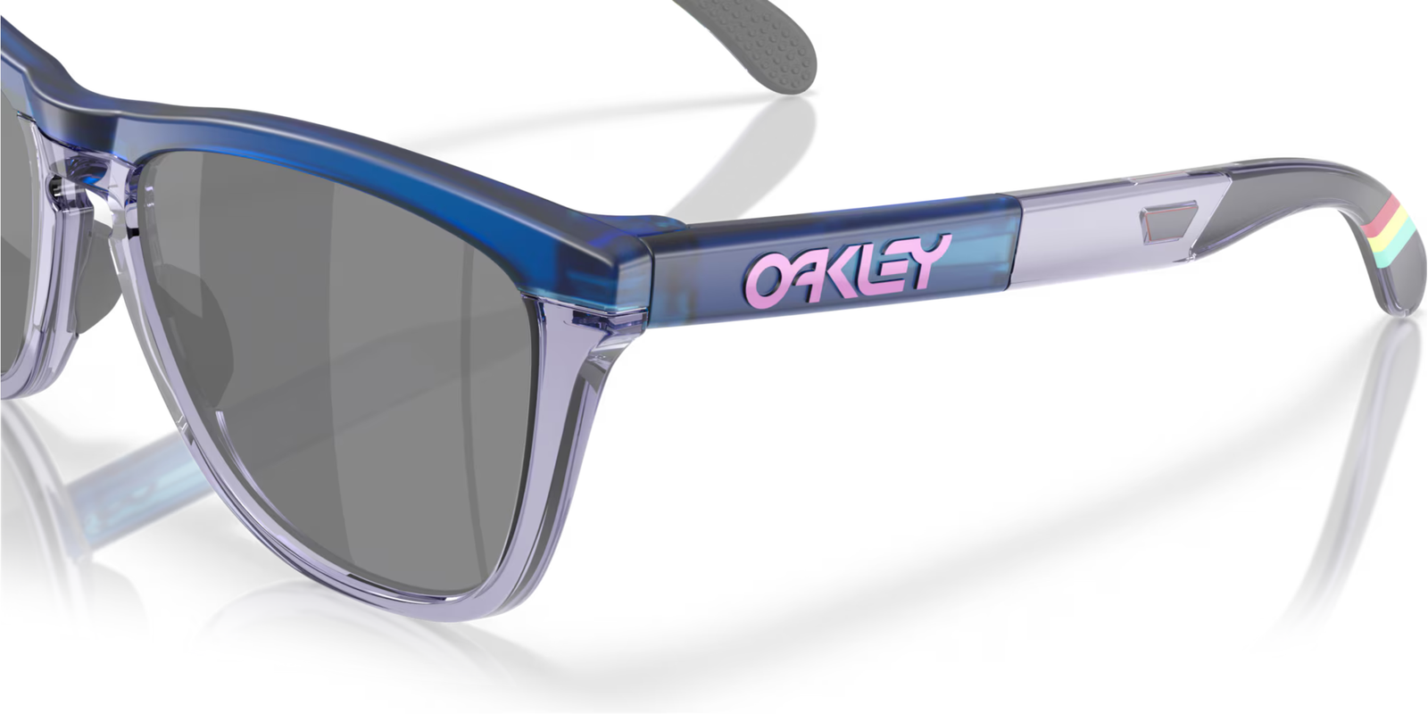 up close of arm oakley frogskin fortnite sunglasses, classic style polarised sunglasses, blue and grey frame with dark grey lense