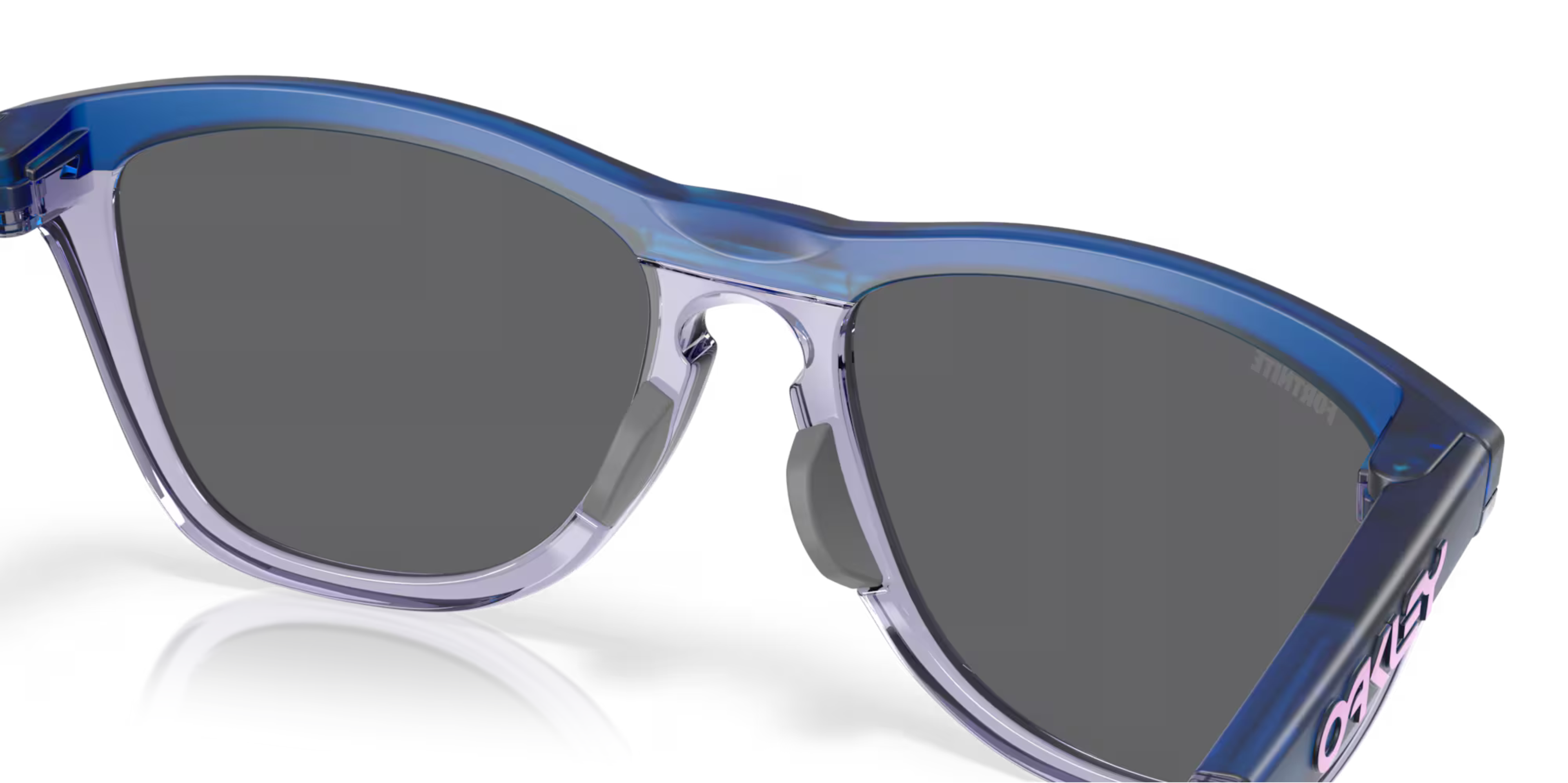 up close of back of oakley frogskin fortnite sunglasses, classic style polarised sunglasses, blue and grey frame with dark grey lense