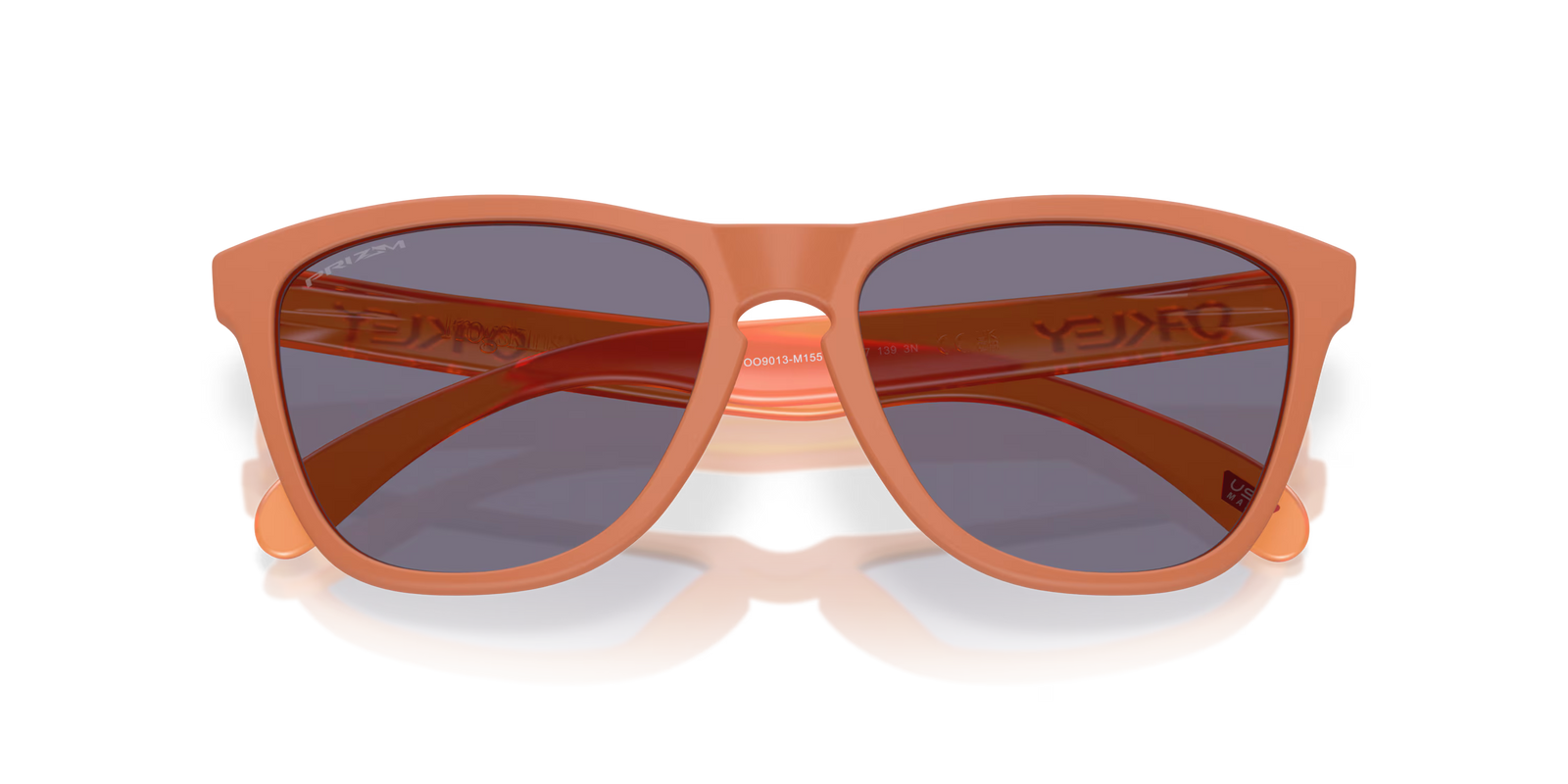 oakley frogskins sunglasses with a prizm grey lens and matte ginger frame