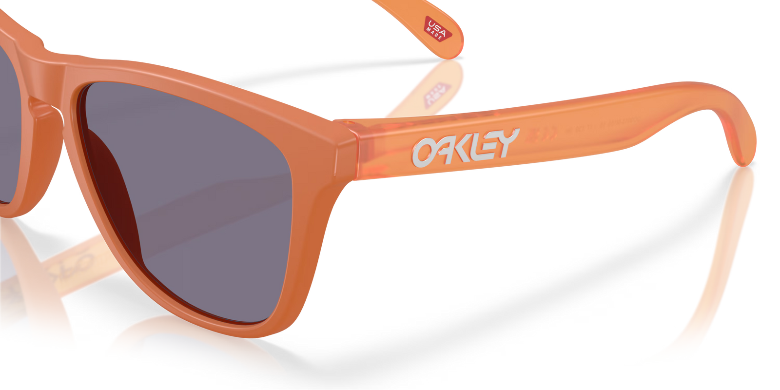 oakley frogskins sunglasses with a prizm grey lens and matte ginger frame