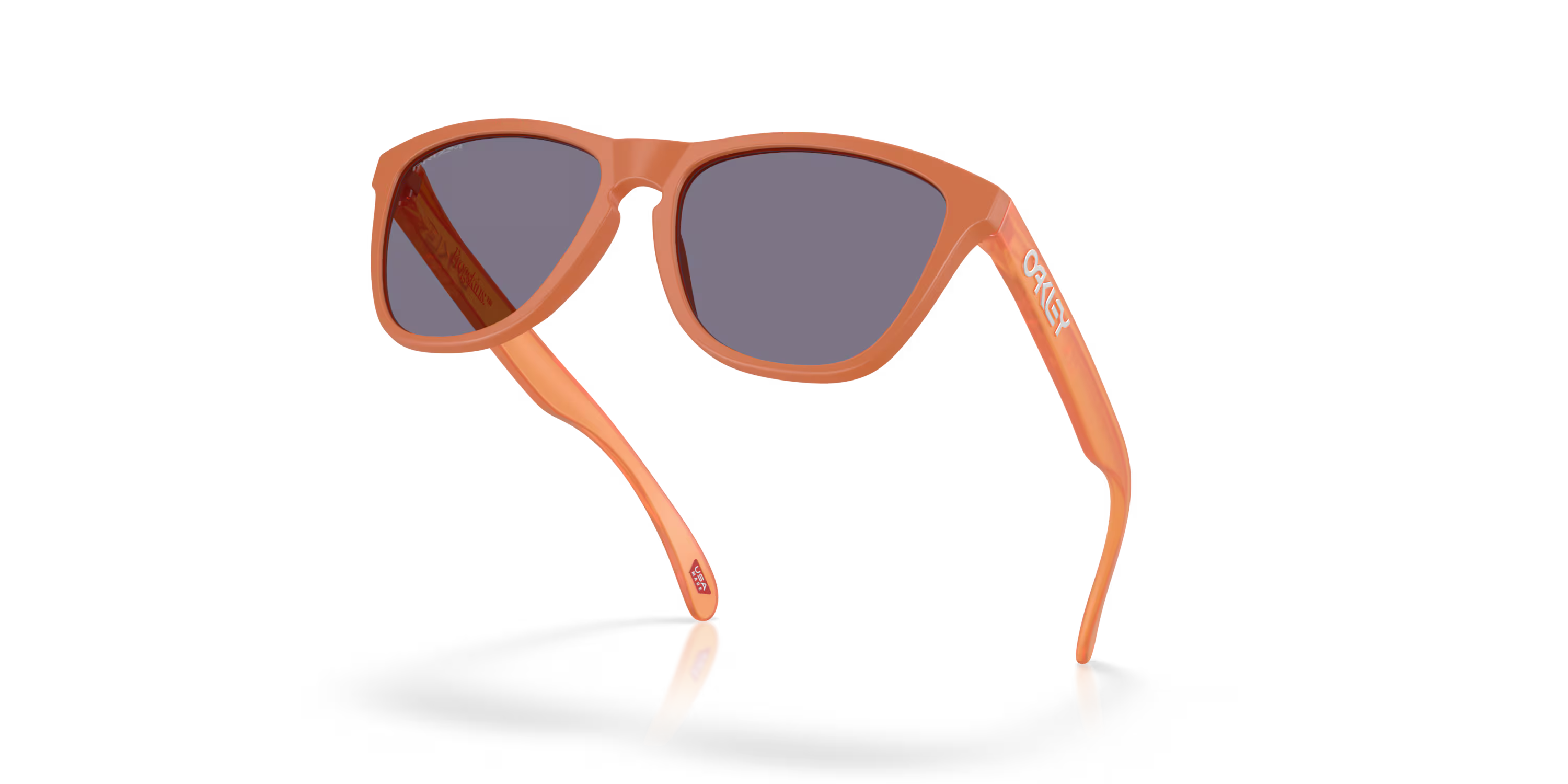 oakley frogskins sunglasses with a prizm grey lens and matte ginger frame