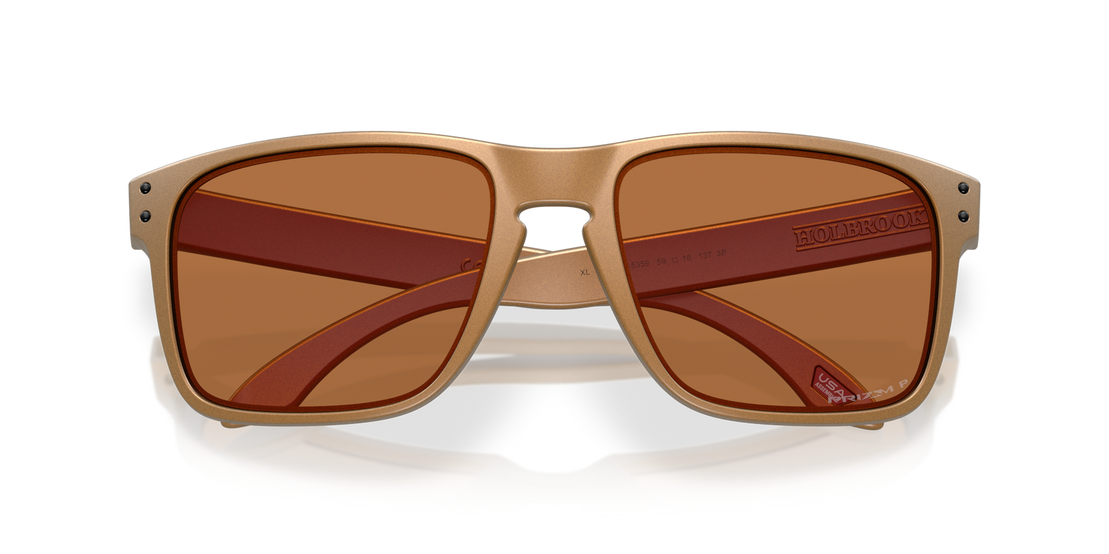 Oakley holbrook XL alloy sunglasses, bronze frame and bronze Polarized lenses. Highly durable with all day comfort. Close front view of sunglasses