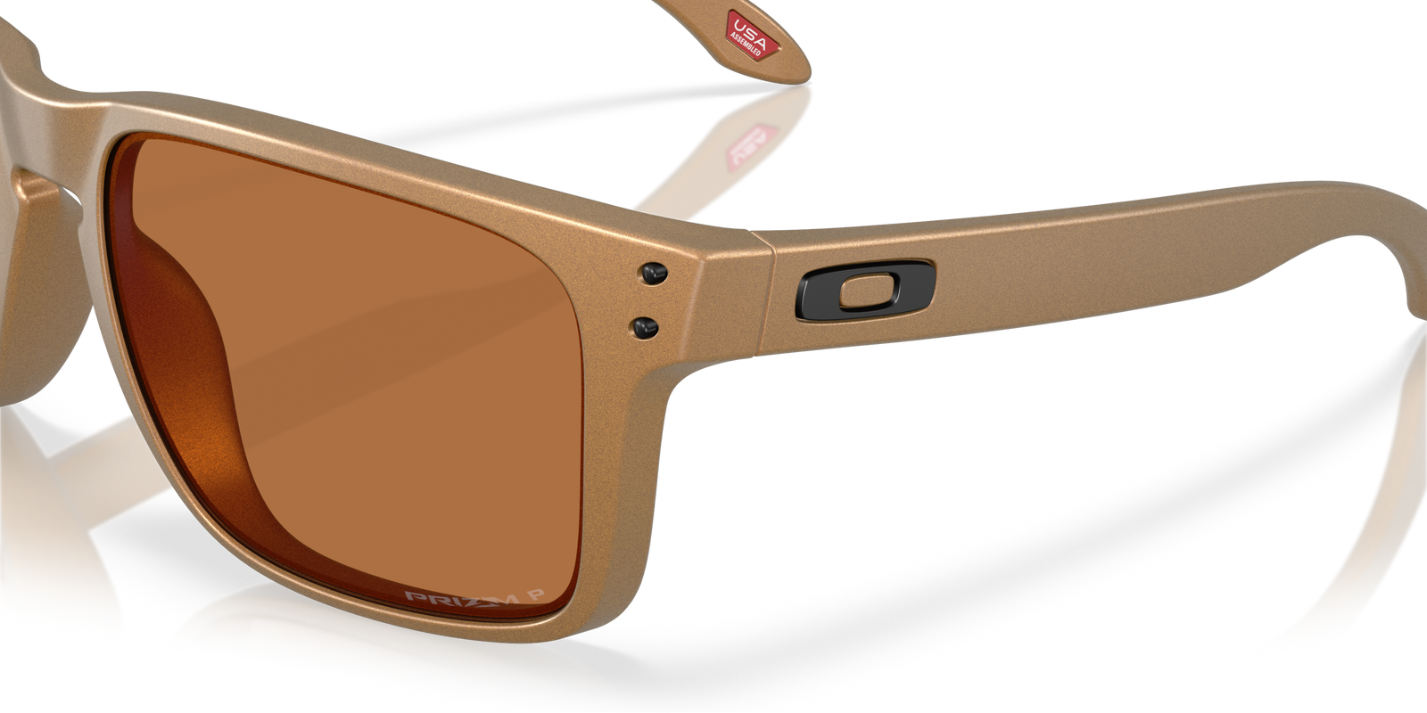 Oakley holbrook XL alloy sunglasses, bronze frame and bronze Polarized lenses. Highly durable with all day comfort. Close up view of both the lenses and frame.