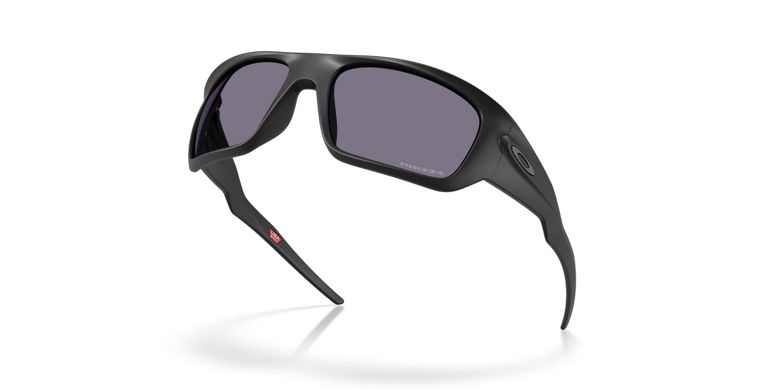 Oakley masseter sunglasses with black frame and grey prizm lenses - tilted view