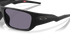 Oakley masseter sunglasses with black frame and grey prizm lenses, closeup of one lens and logo