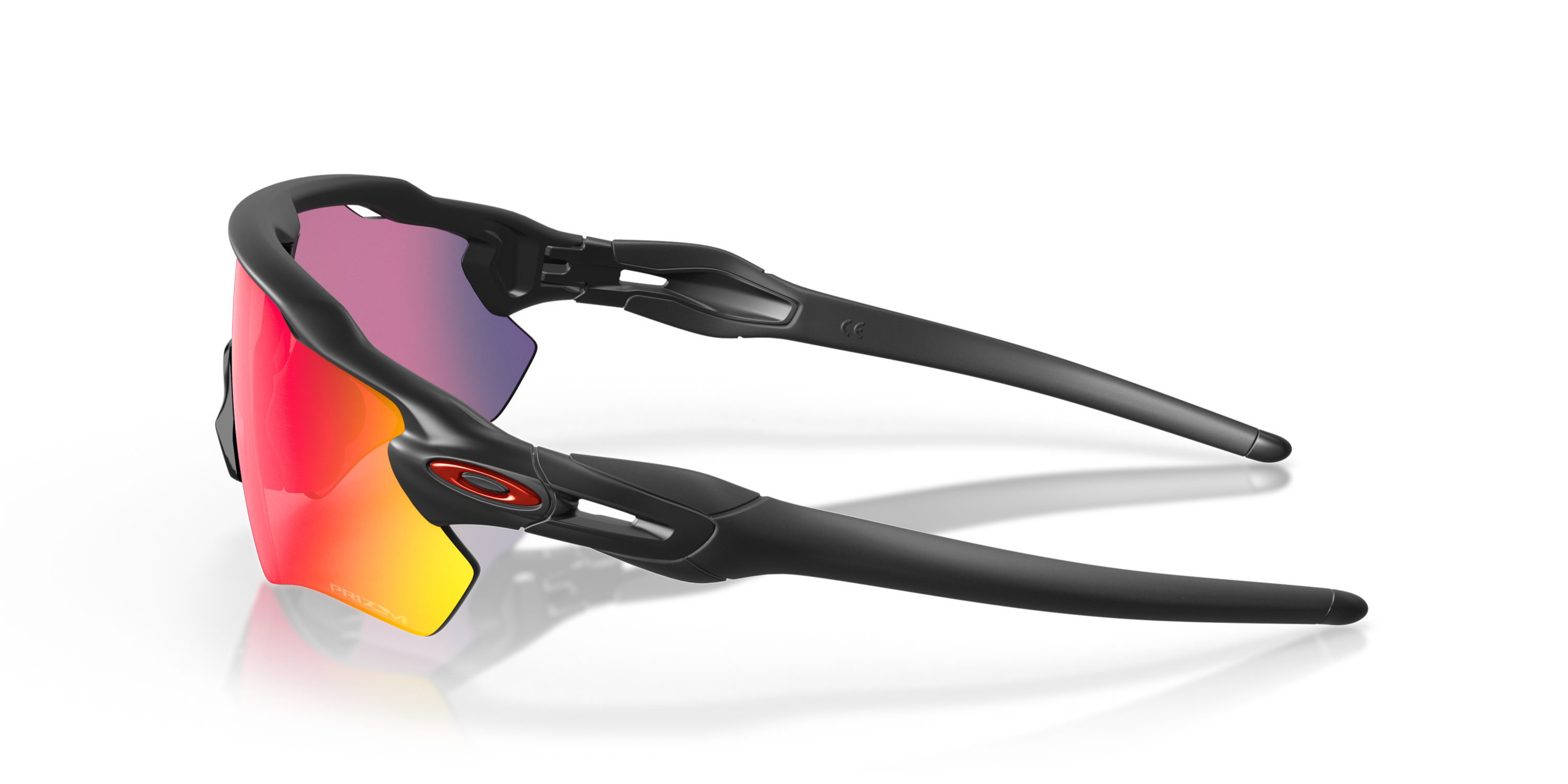 oakley radar ev path sunglasses with black frame and red and blue lenses on a white background