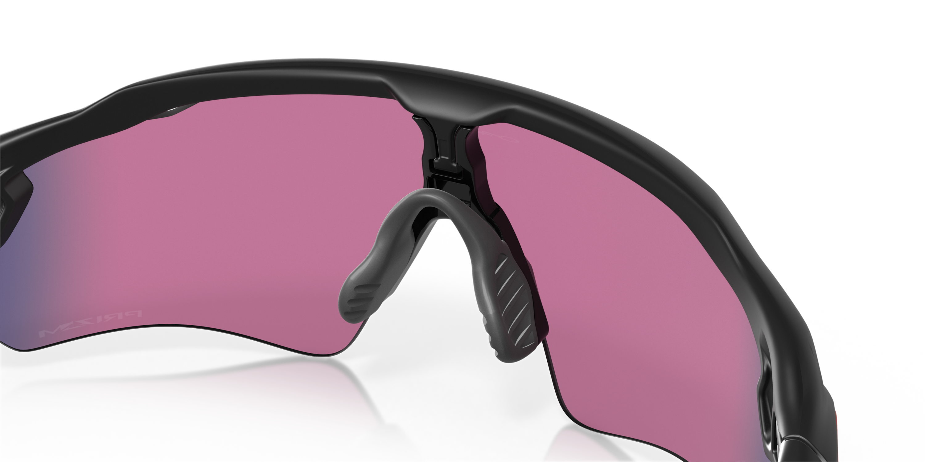 oakley radar ev path sunglasses with black frame and red and blue lenses on a white background