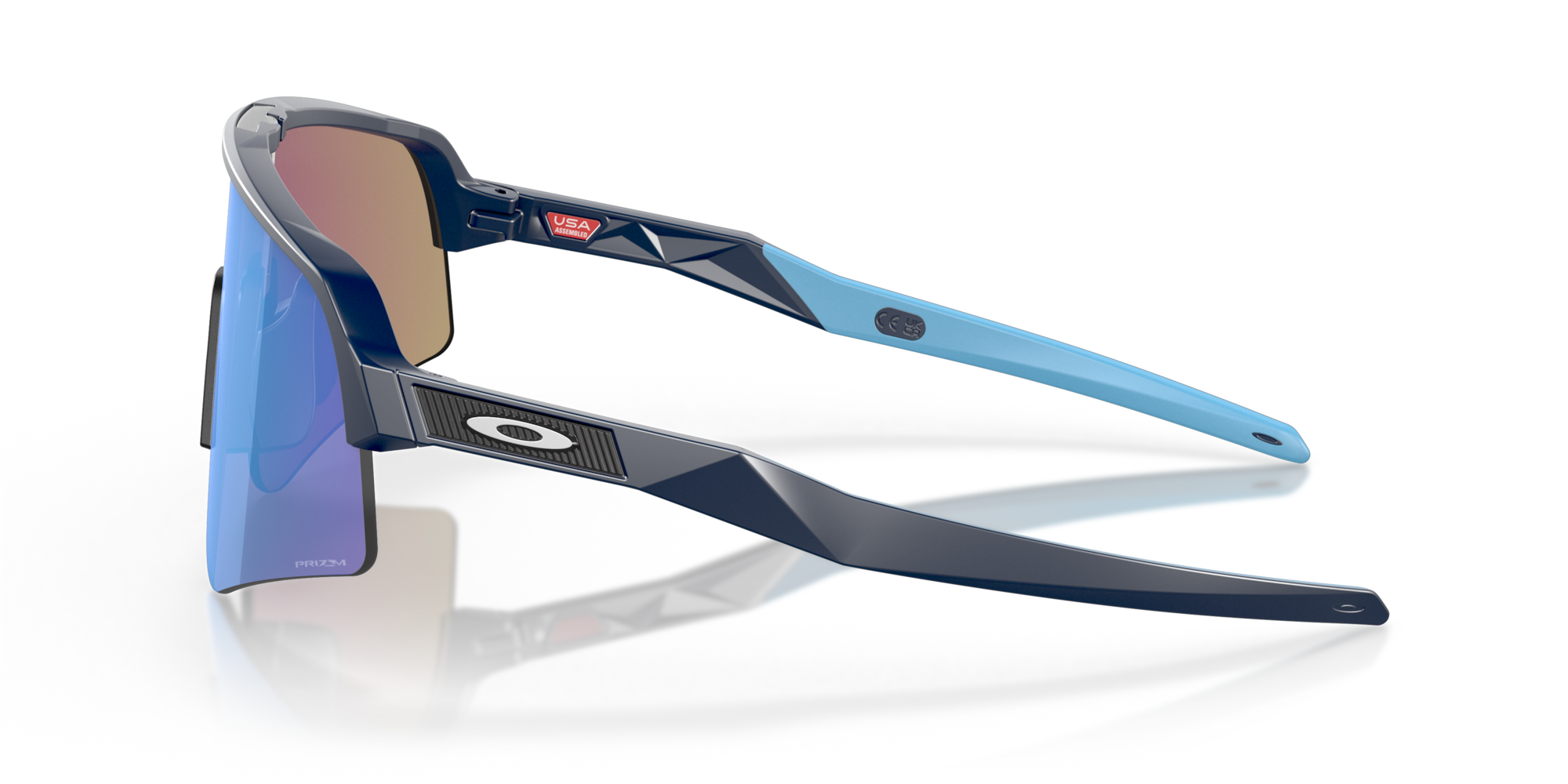oakley sutro lite sweep sunglasses. A functional sport design with optimised coverage, extended field-of-view, retention and impact protection. navy frame with blue and purple lenses. Side view of glasses. 