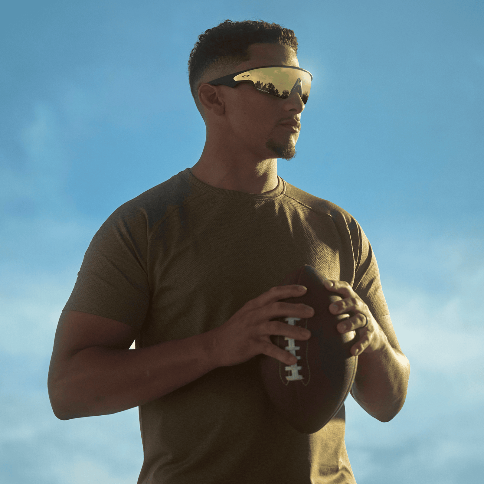 man wearing oakley meta vanguard ai glasses for running in prizm 24k bronze