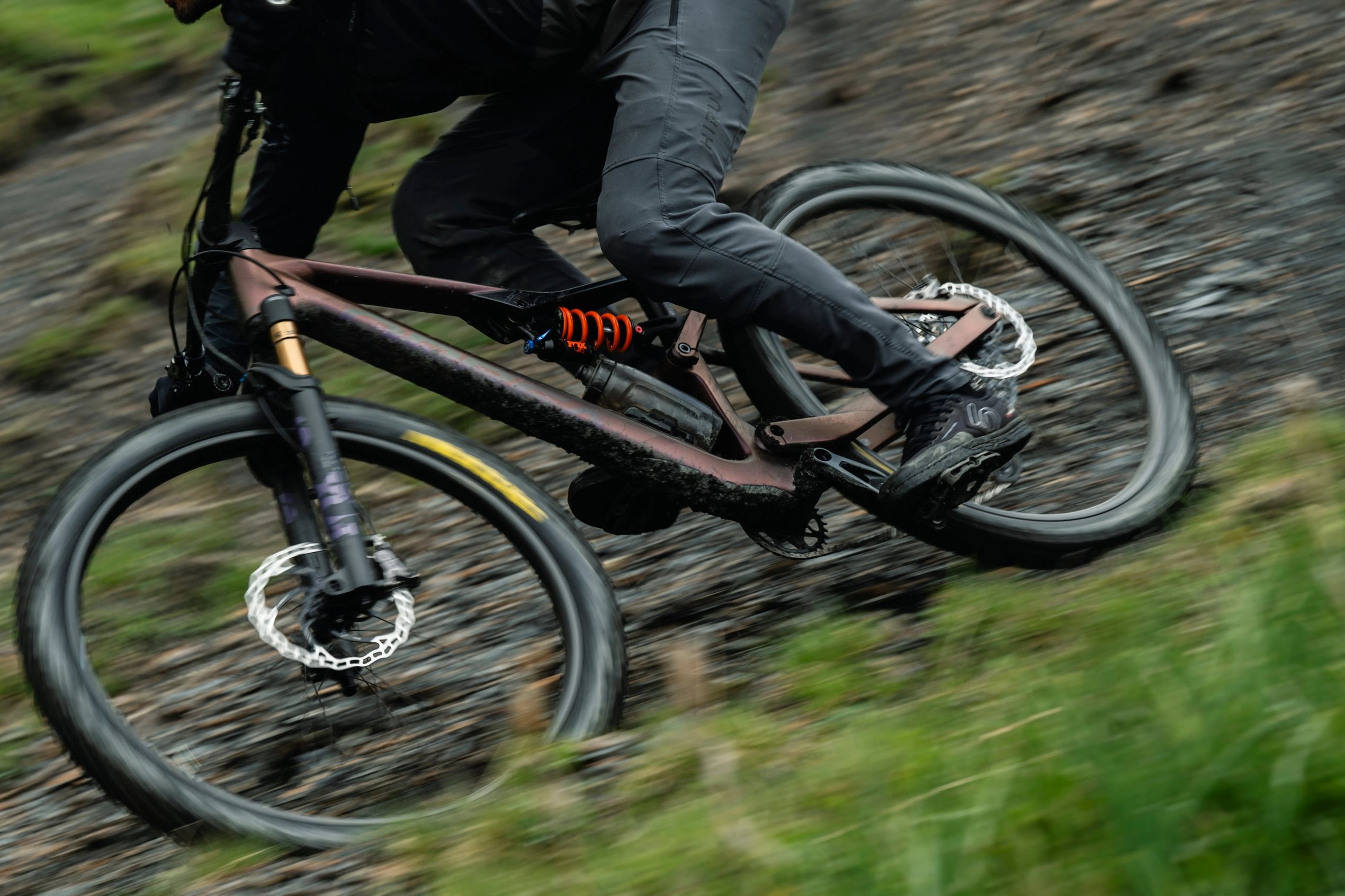 man riding the orbea occam lt mountain bike downhill