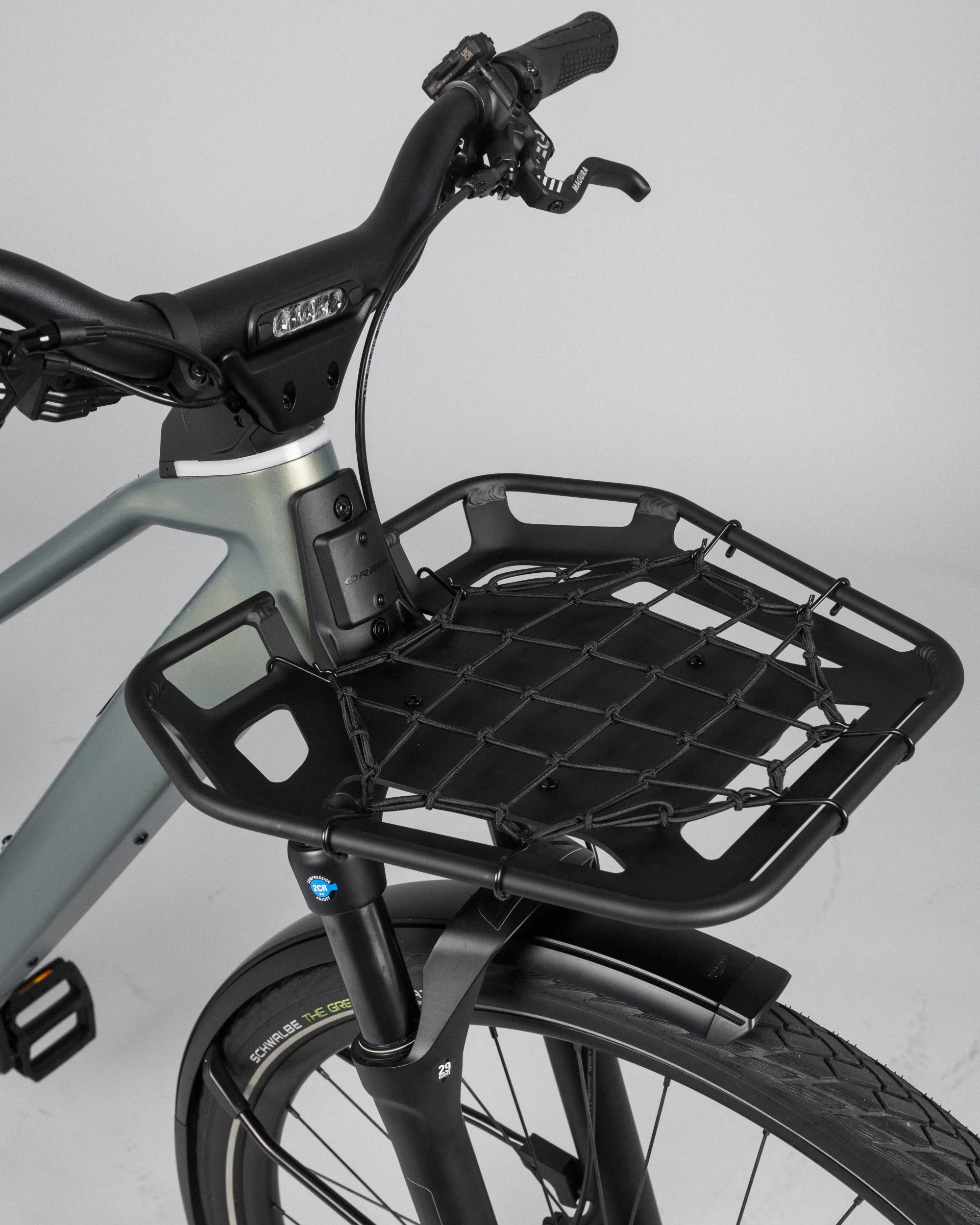 close up of the optional front rack on the orbea kemen tour ebike