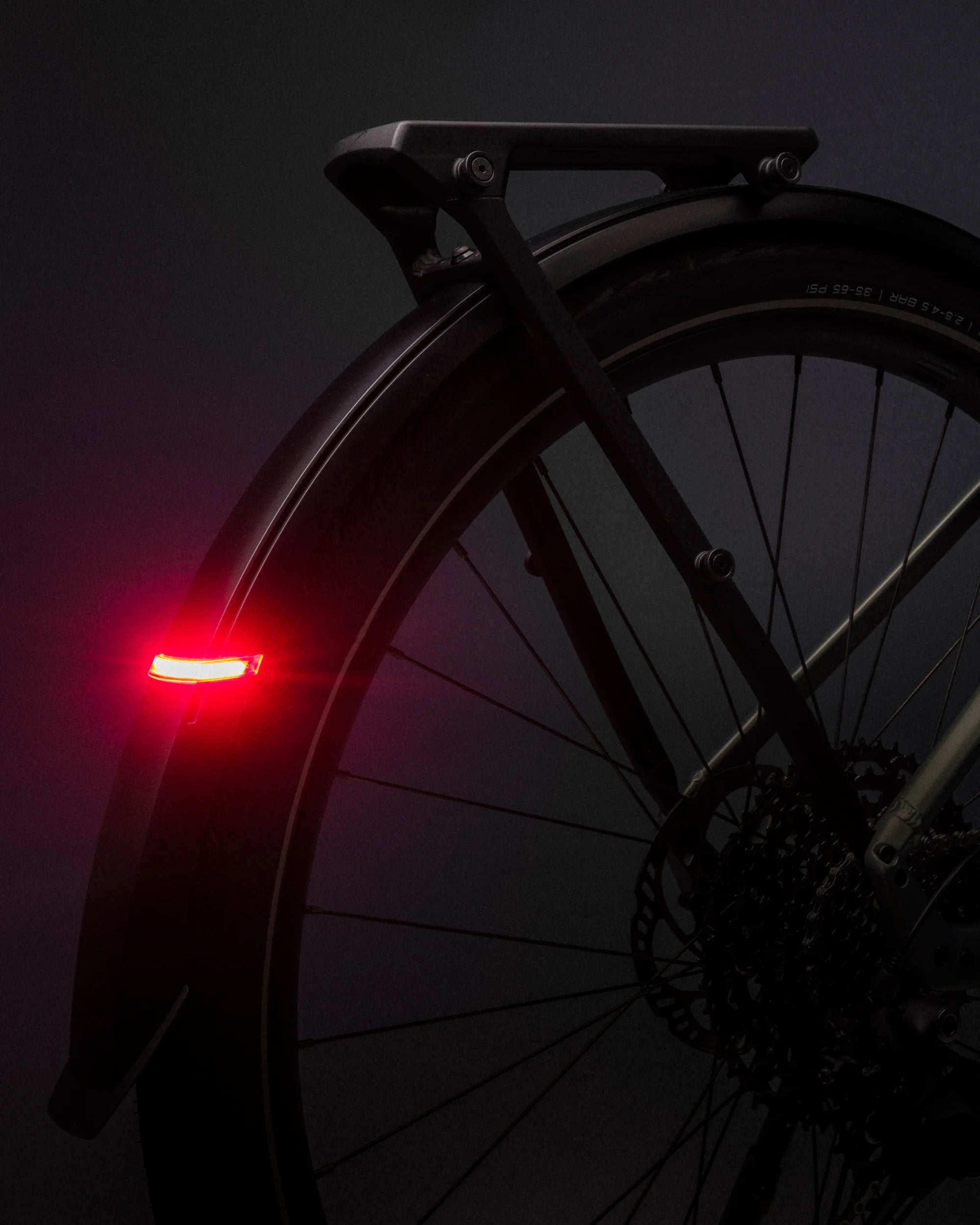 close up of wrap around rear light on the orbea kemen tour ebike