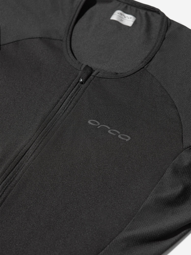 orca athlex lite trisuit for men, black colour for triathlons, close up of orca logo