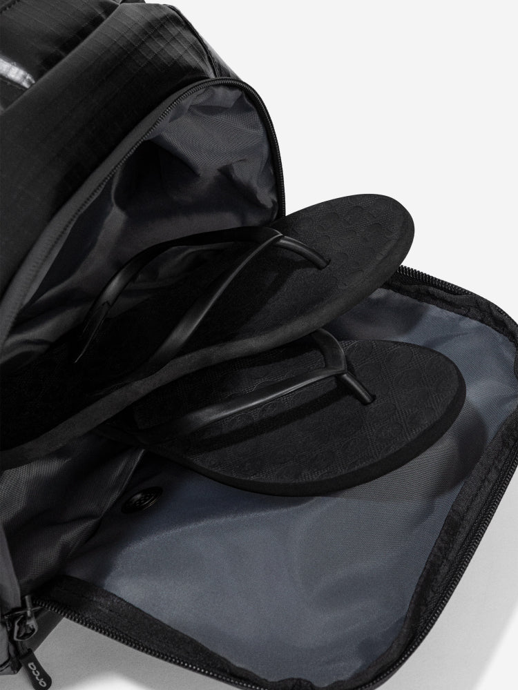 orca training backpack, 30 L capacity, showing open pocket with flip flops inside
