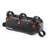 Black Ortlieb bikepacking bag with orange straps on a white background