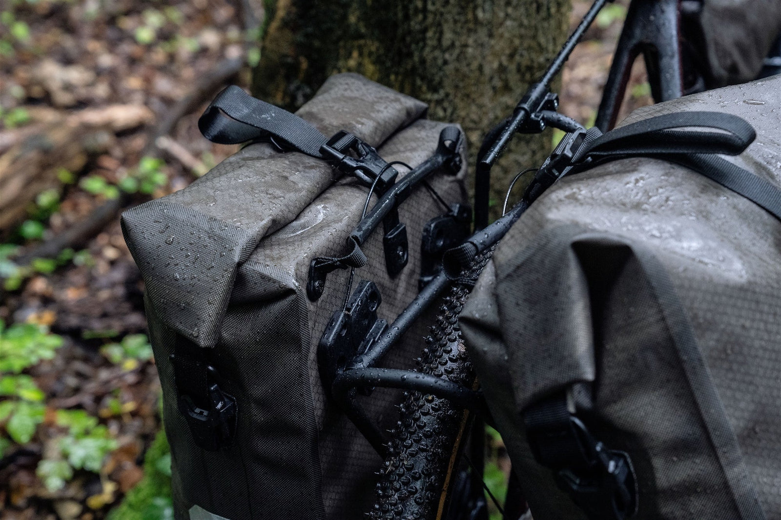 Ortlieb gravel bike bags attached to a bicycle with a natural background