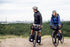 Two cyclists on a dirt path with ortlieb bicycle panniers and bags