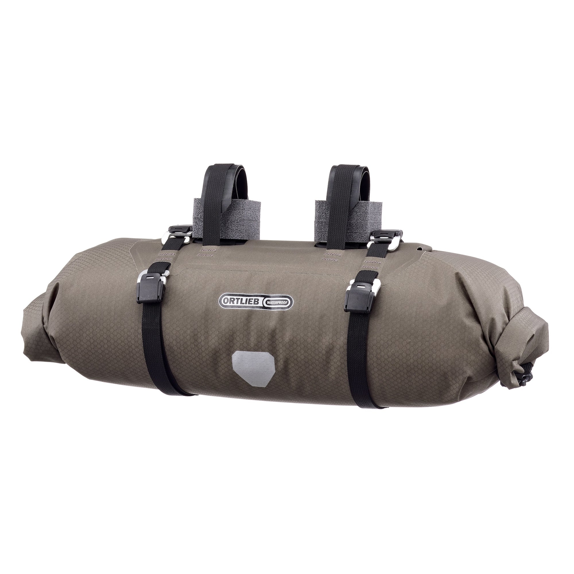 Brown Ortlieb bike handlebar bag with black straps on a white background