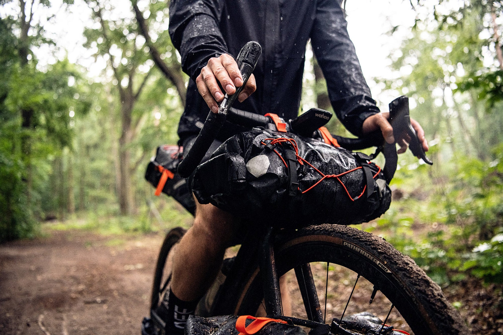 Person on a bike with gear attached to bike in Ortlieb panniers and bike bags