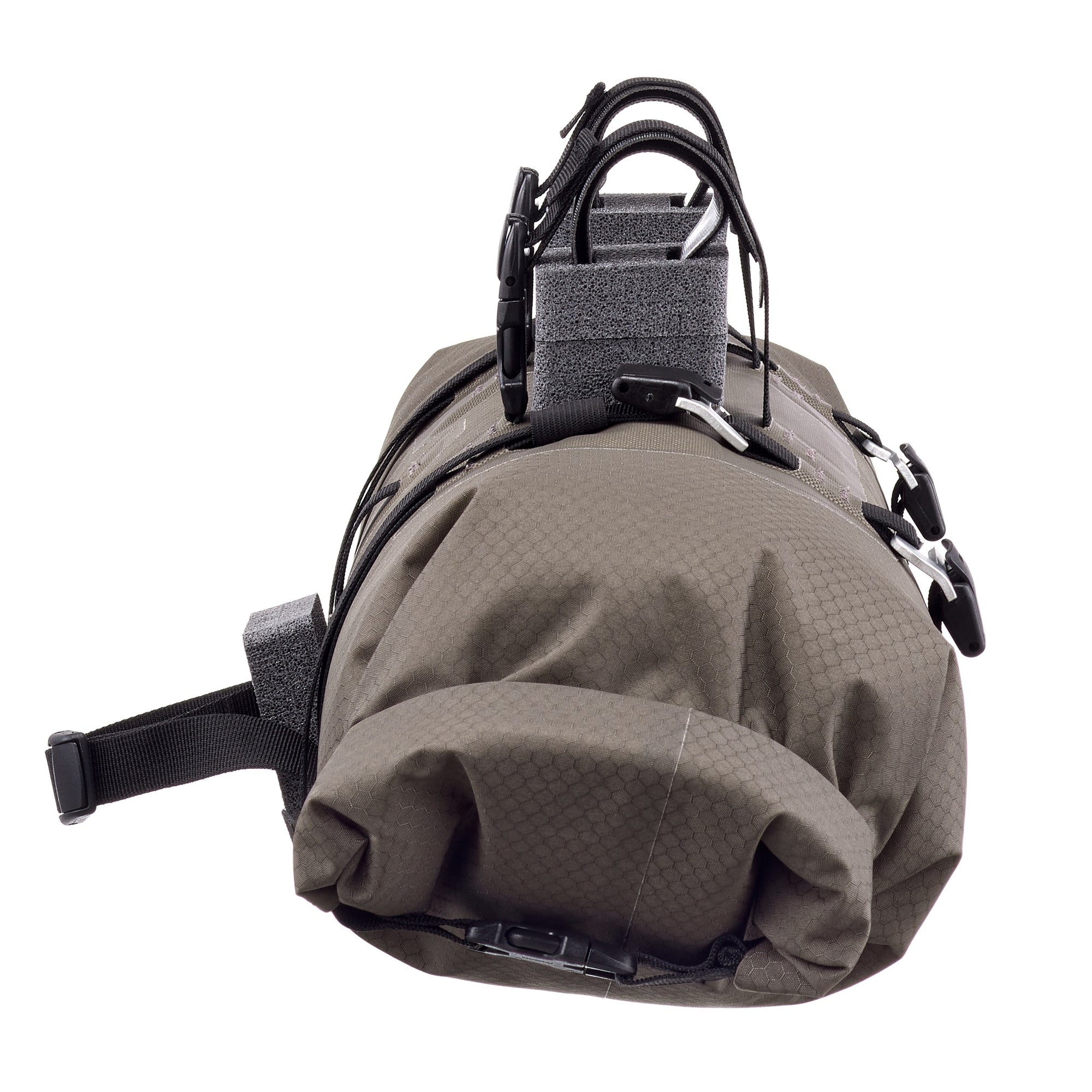 Brown ortlieb handlebar bag with black straps on a white background
