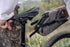 Ortlieb bicycle saddle bag being attached to a bike with a natural outdoor background