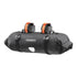 Black ortlieb handlebar bag with orange straps on a white background